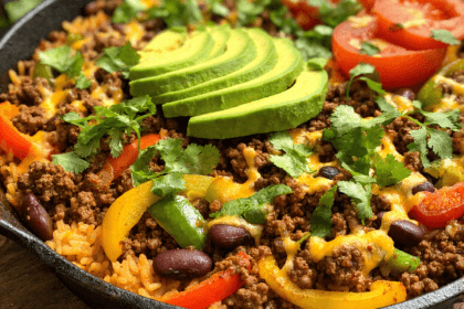High-protein beef burrito skillet with ground beef rice beans cheese and avocado