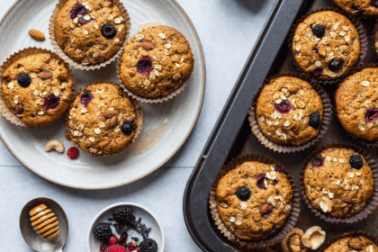 Top view of baked oatmeal cups with oats berries and nuts for meal prep breakfast