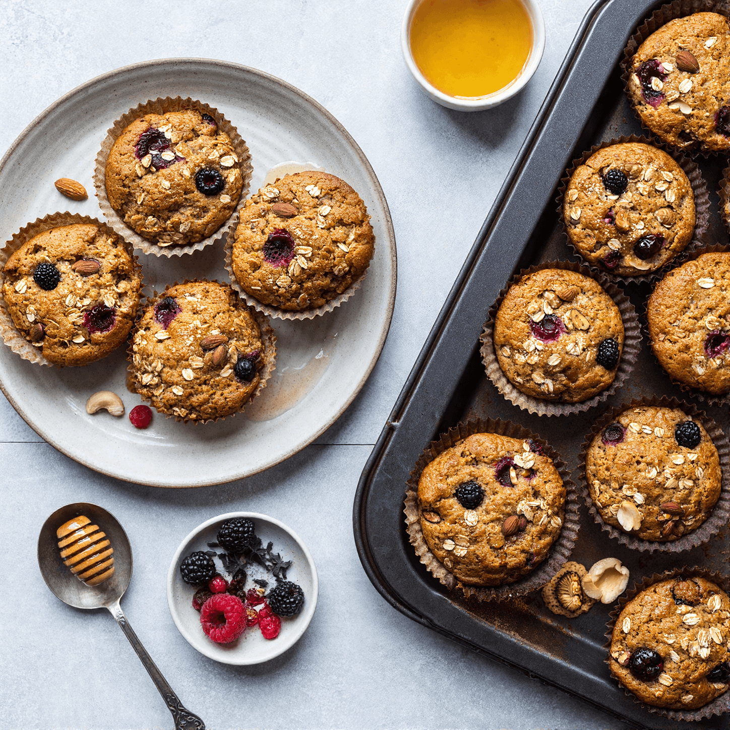 Top view of baked oatmeal cups with oats berries and nuts for meal prep breakfast